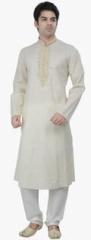 Manish Creations Solid Cream Kurta Set With Churidar Pyjama men