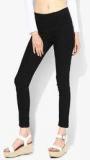 People Black Solid Mid Rise Jeggings Women