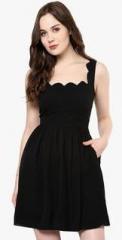 Roving Mode Black Solid Skater Dress women