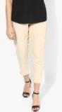 Sangria Beige Solid Coloured Pants Women