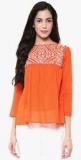 The Vanca Orange Solid Blouse Women