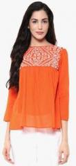 The Vanca Orange Solid Blouse women