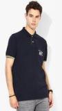 Tommy Hilfiger Navy Blue Solid Regular Fit Polo T Shirt men