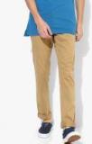 Blackberrys Beige Solid Mid Rise Slim Fit Chinos Men