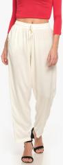 Go Colors Cream Solid Coloured Pant women