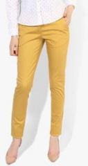 Park Avenue Mustard Yellow Solid Slim Fit Chinos women