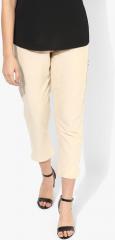 Sangria Beige Solid Coloured Pants women