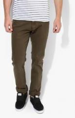 Tommy Hilfiger Olive Solid Mid Rise Slim Fit Jeans men