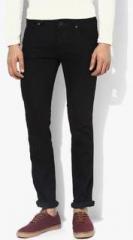 Wrangler Black Solid Slim Fit Jeans Skanders men